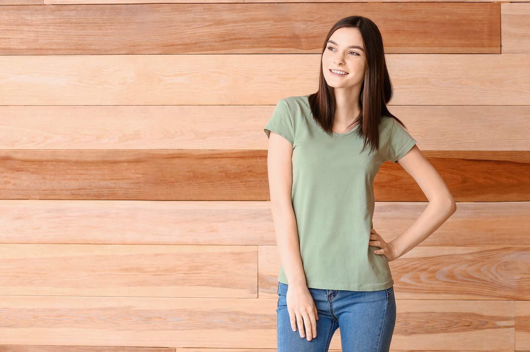 Woman in Stylish T-Shirt on Wooden Background