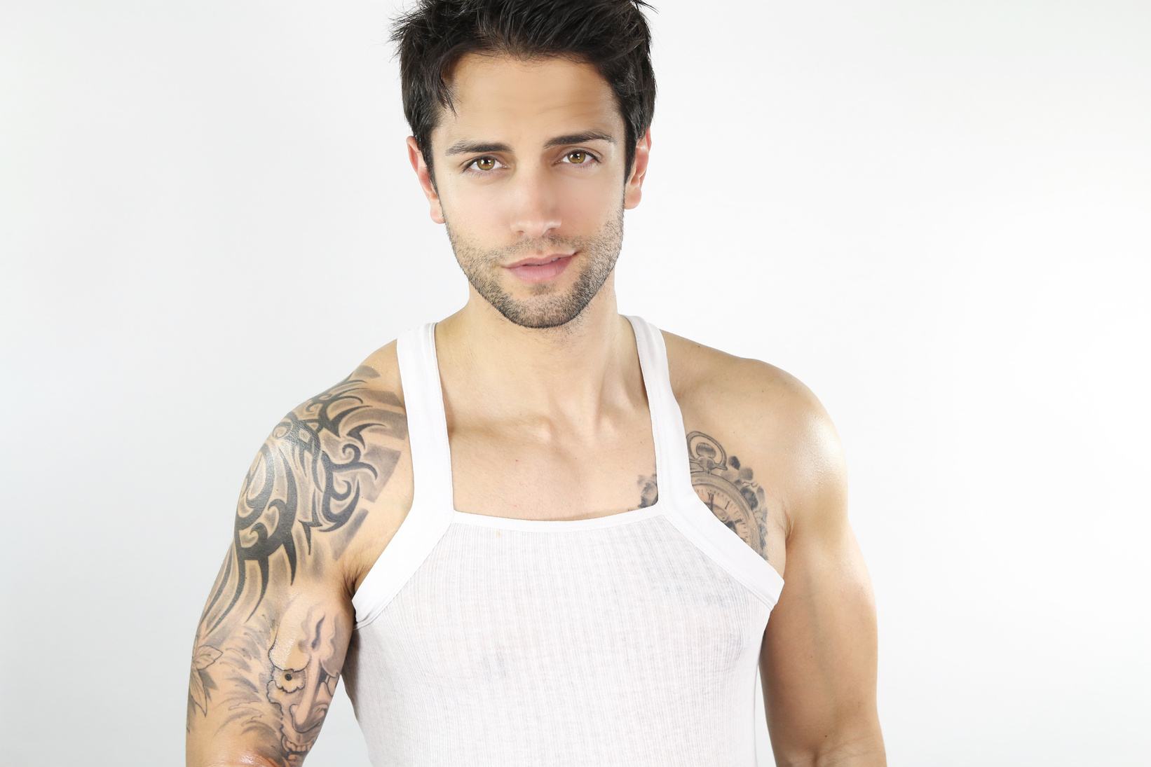 muscular man in tank top smiling